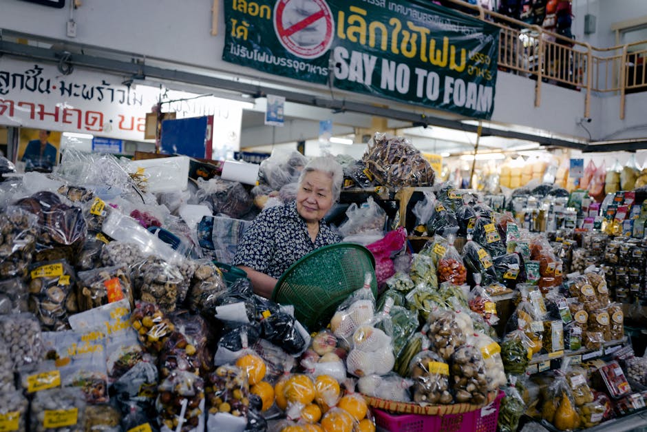 주식 시장과 투자 정보 차트를 바라보는 경제 초보자의 모습